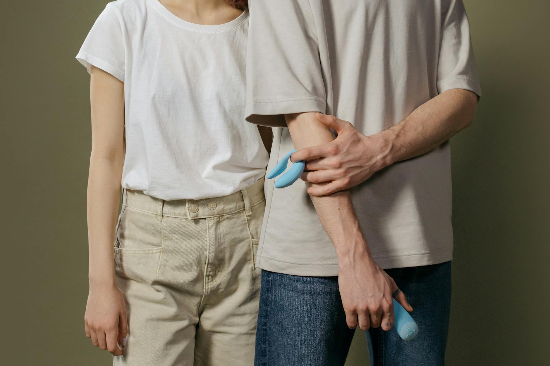 A couple standing together indoors, exploring intimacy with intention and presence